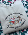 Never getting caught Santa embroidered sweater